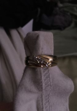 14 k solid gold ring with 4 diamonds