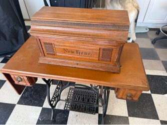 Antique New Home Treadle Sewing Machine with Cabinet
