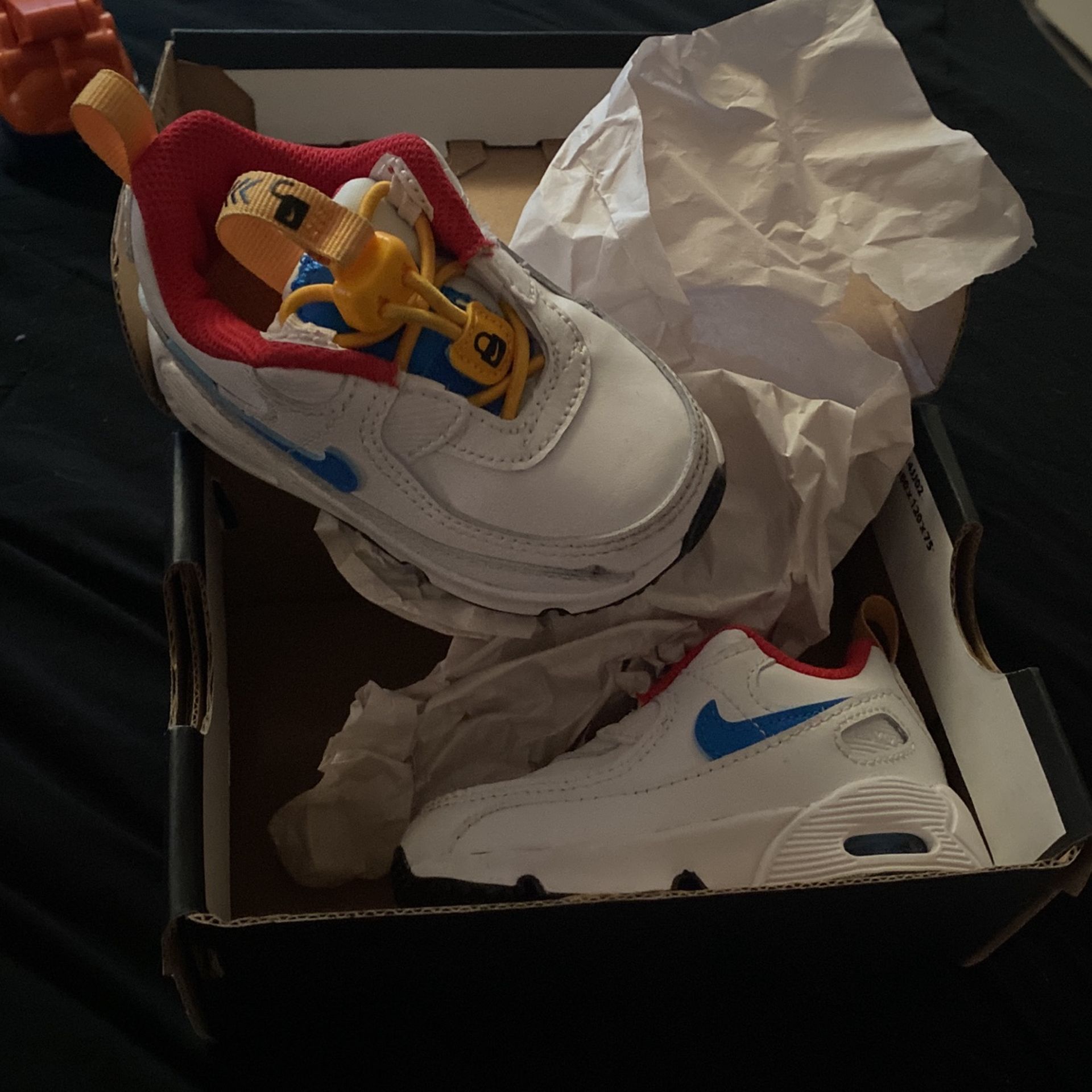 Baby Nikes size 4