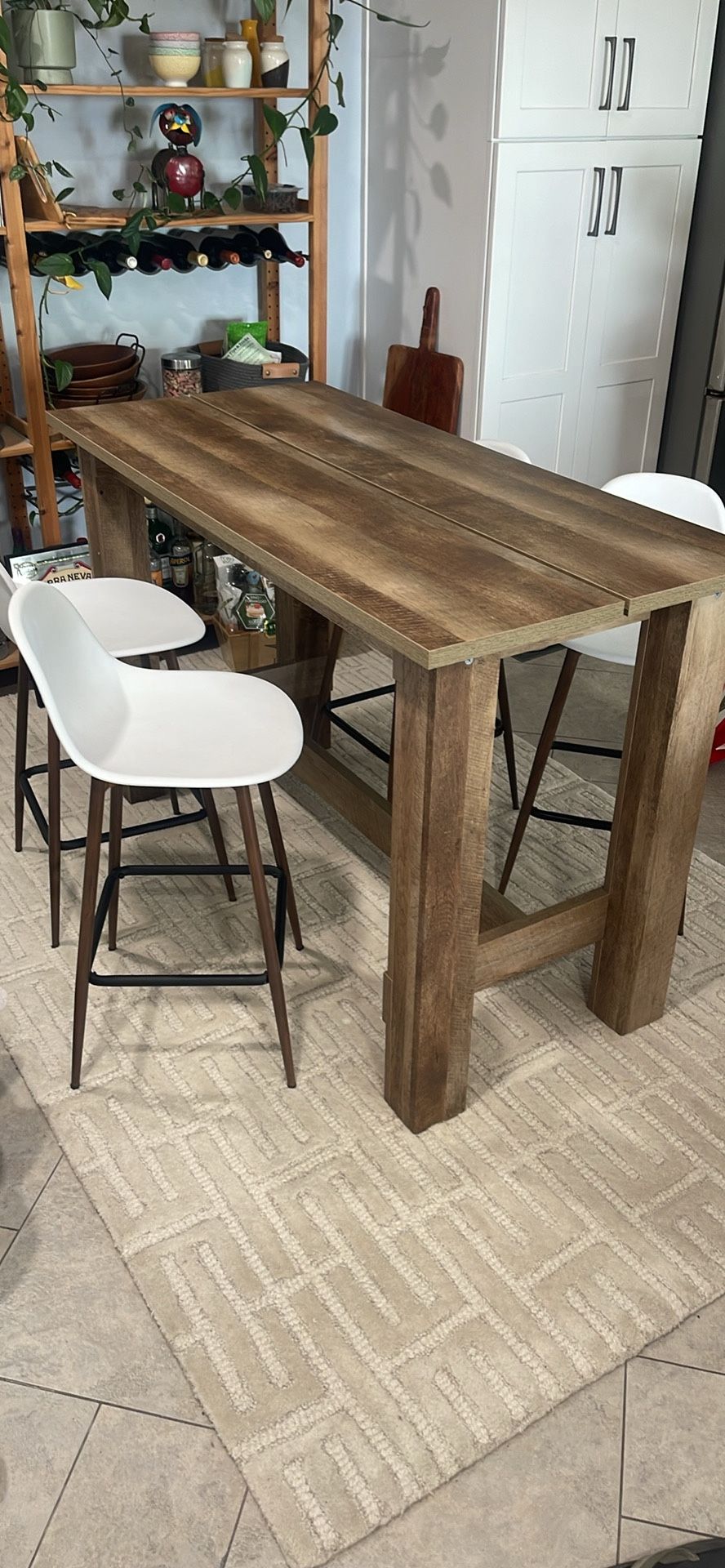 Bar height table and four chairs, great condition.
