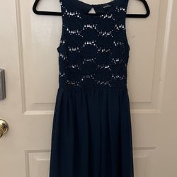 girl’s dark blue sequined dress 