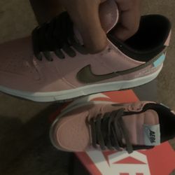 pink and Black Nike Dunkes 