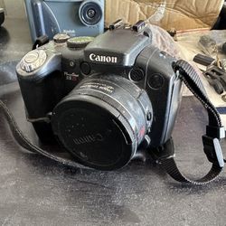 Canon IS-10 Point And Shoot Camera 