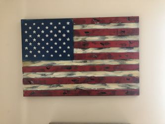 Metal American flag 2ft long and 16 inches tall
