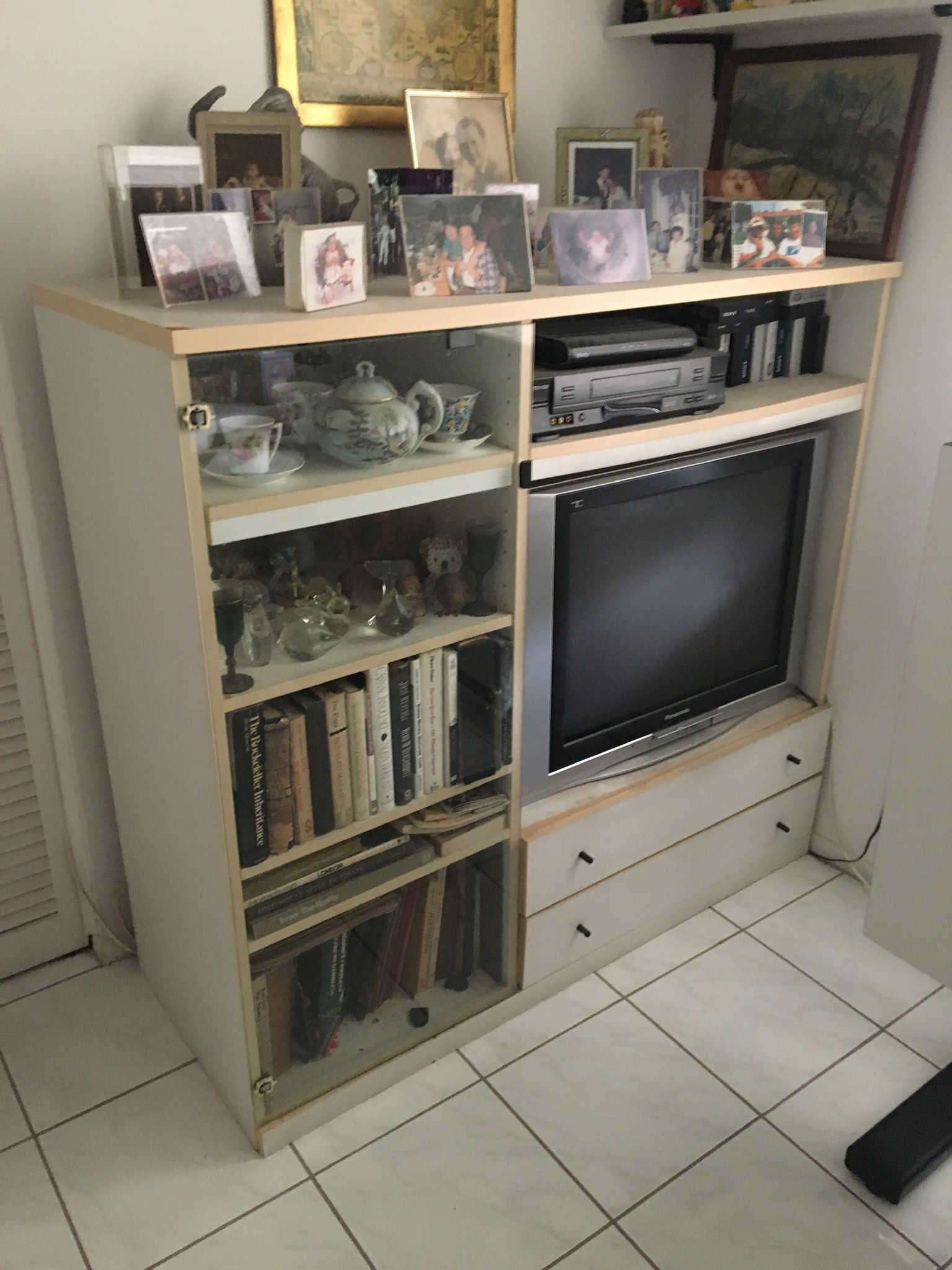 Wall Unit With Glass Door And 6 Sections, 2 Drawers And TV Compartment.