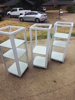 Set of 3 White Metal Glass Display Cases on Wheels (18"x18"x48")