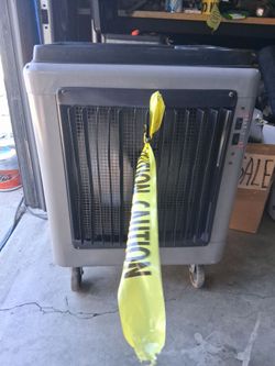 Garage swamp cooler with tool tray