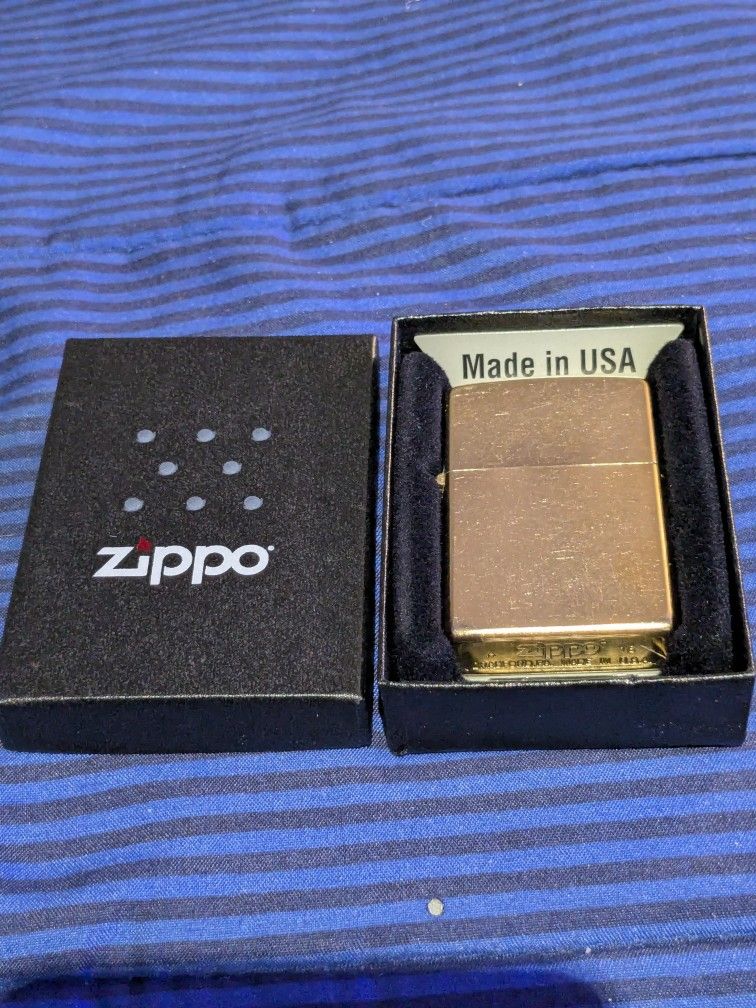 New Gold Dust Zippo