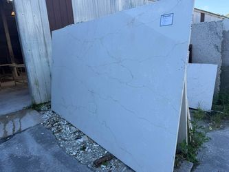Granite Quartz countertops Material fabrication and install 50 dollars per square foot
