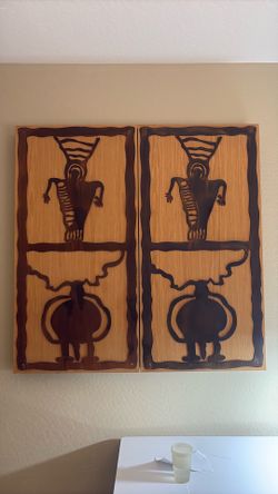 Metal and wood tribal style wall art and board