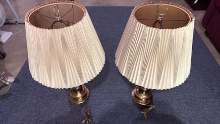 Pair of brass lamps