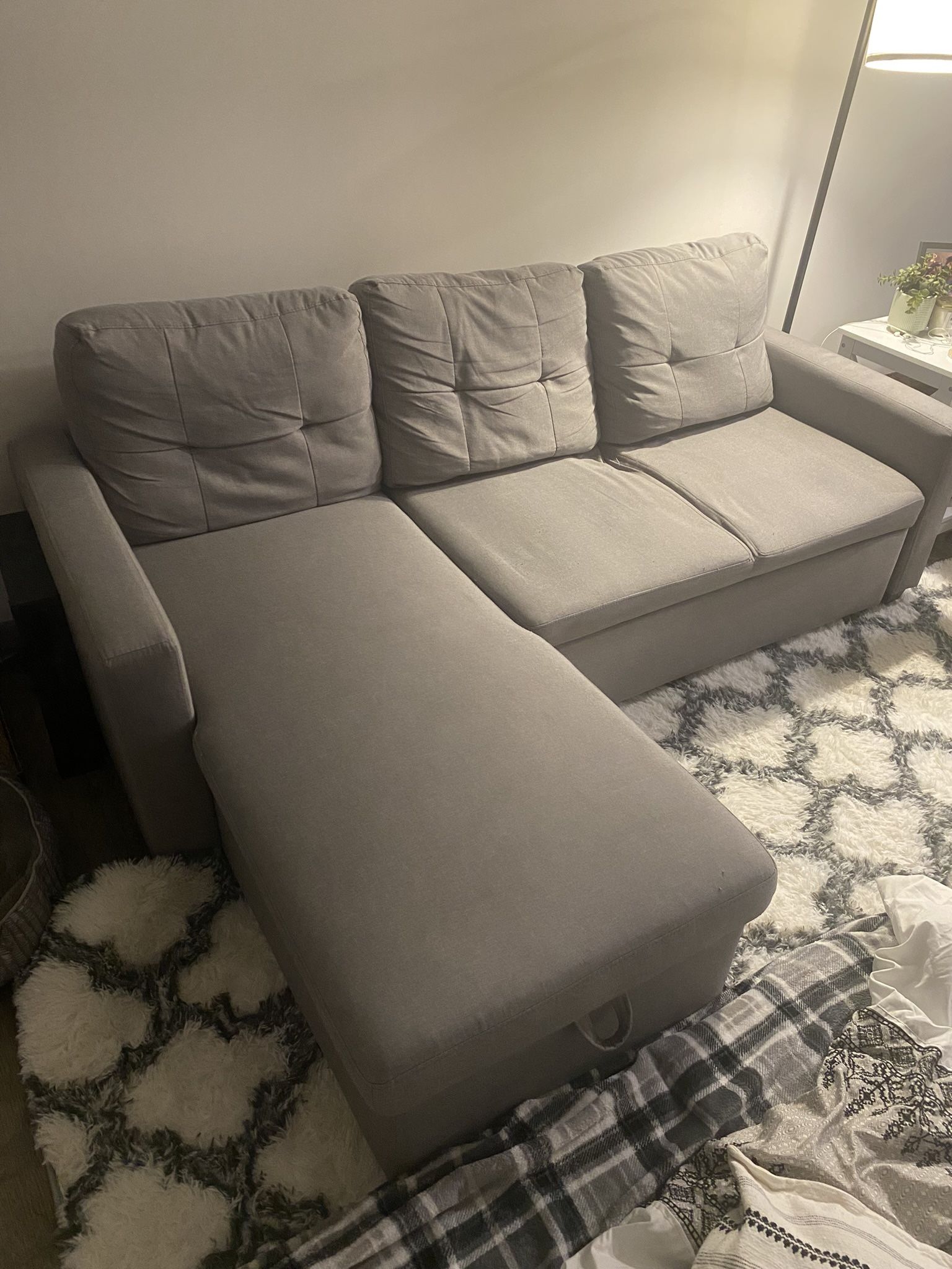 Couch With Storage Ottoman And Pull Out Leg Rest