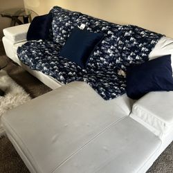 White Leather Sectional … With Rug