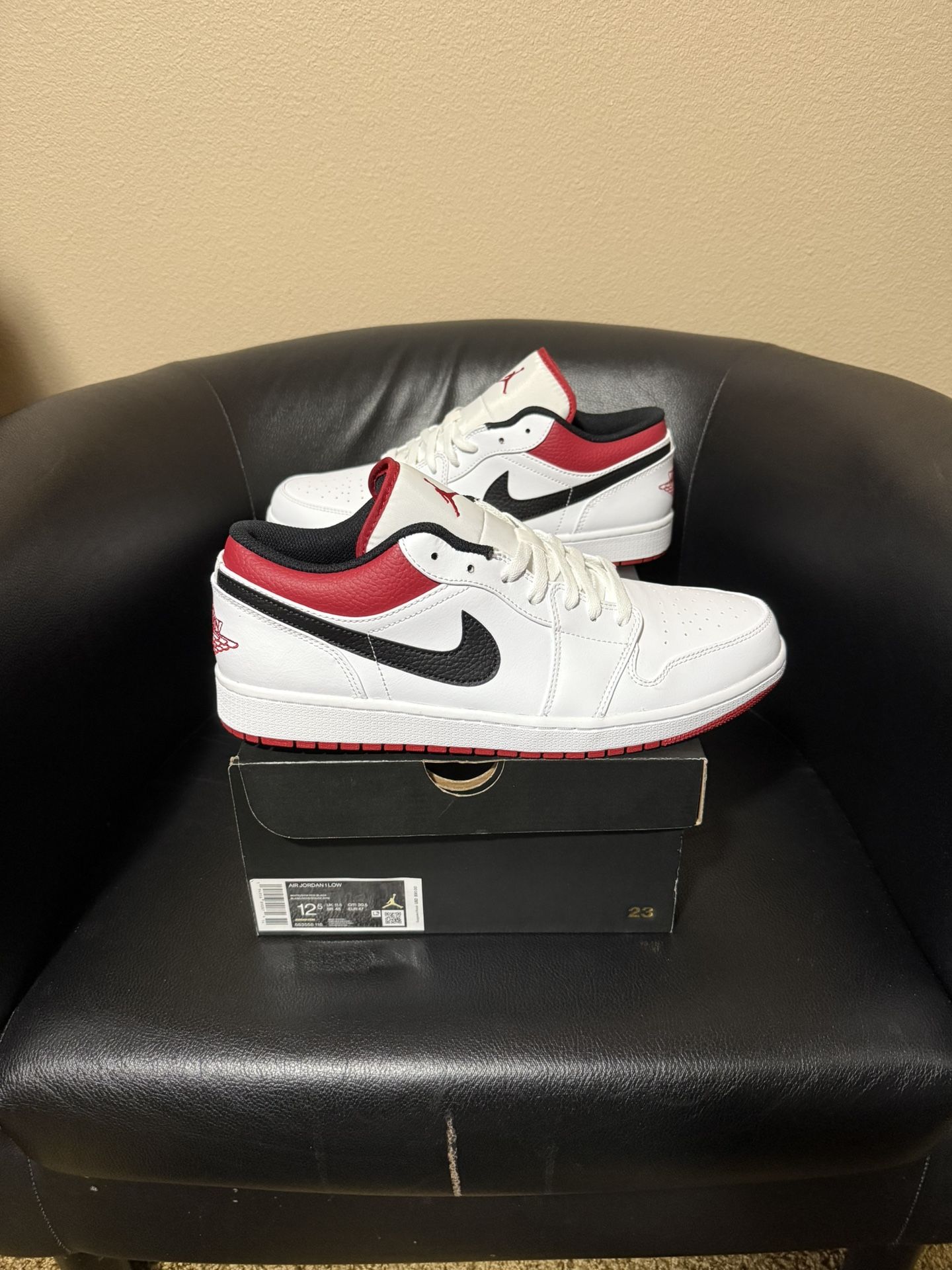 Brand new Air Jordan 1 lows White University Red size 12.5 with original box and proof of purchase.