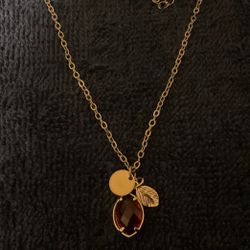 18” SilverTone Necklace With Ruby Rhinestone Pendant 