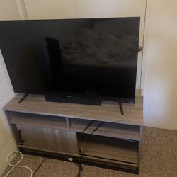 TV, night stand, soundbar