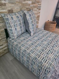 Multicolor Ottoman with Pillows