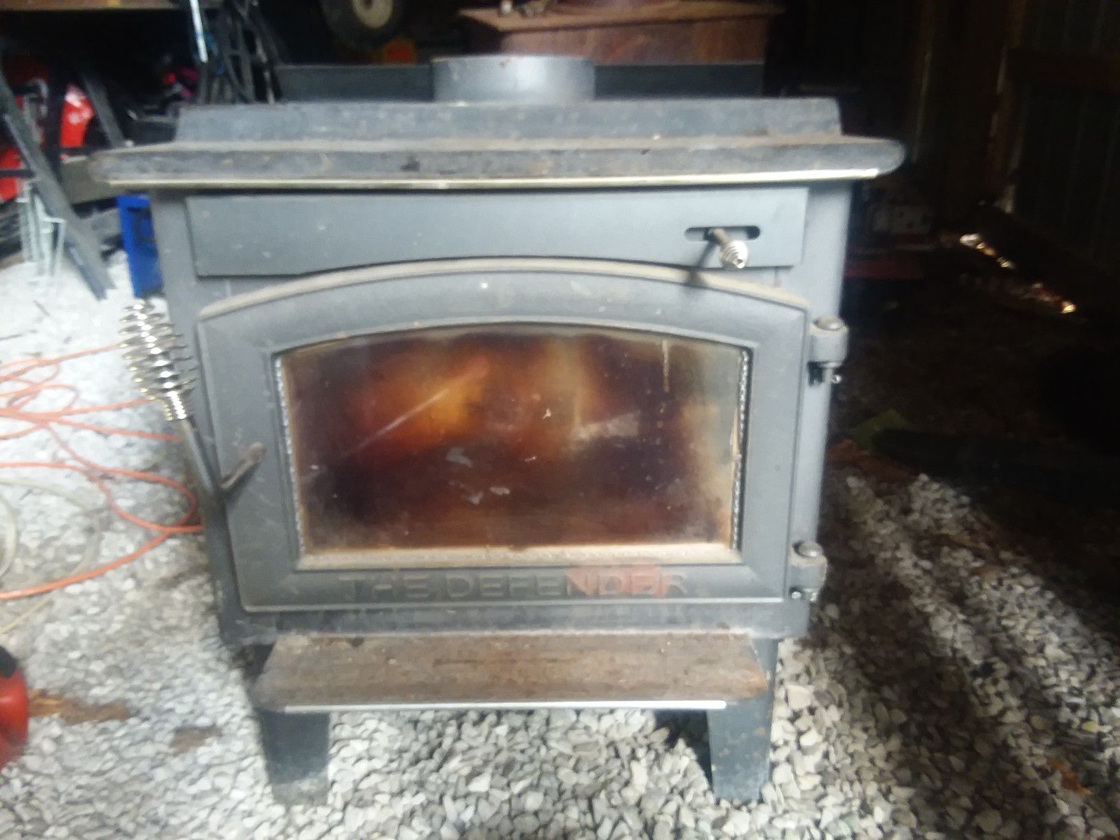 Wood burning stove with blower.