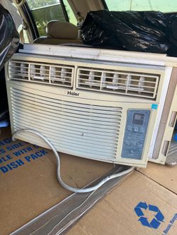 Window AC blows cold air