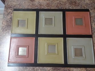 Sold Wood Picture has six mirror areas where a photo can be inserted