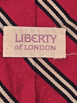 Liberty of London men's tie with red and black stripes. Elegant and stylish design, hand made in USA of 100% imported silk