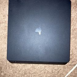 PS4 Slim 1TB ( Includes Cords)