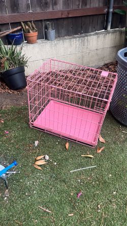 Pink small dog crate