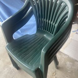 Four Hunter Green Lawn Chairs