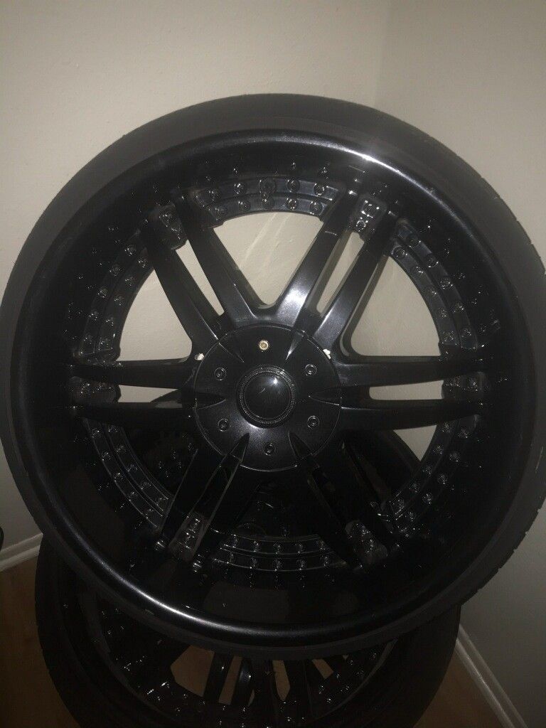 22" five lug universal rims and new tires for sale