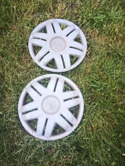Two Hubcaps Toyota Camry