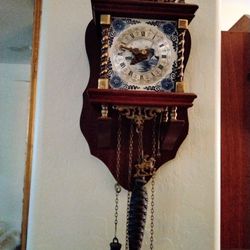 Antique Clock It's Not A Cuckoo Clock And It's Not A Grandfather Clock I've Had It Ages And Ages No Nothing About It Other Than It Works It Dings It's
