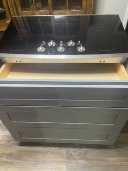 36” GE profile Cooktop With 3 drawer base Cabinet
