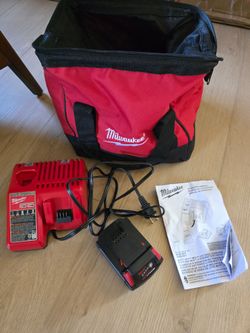Milwaukee m18/m12 charger with m18 battery and tool bag