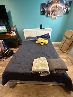 Full bed with a twin trundle and bookshelves