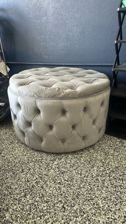 Large light grey storage ottoman
