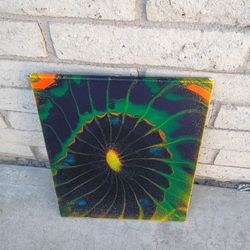 Multicolored Painting And Glitter That Shows Under A Black Light