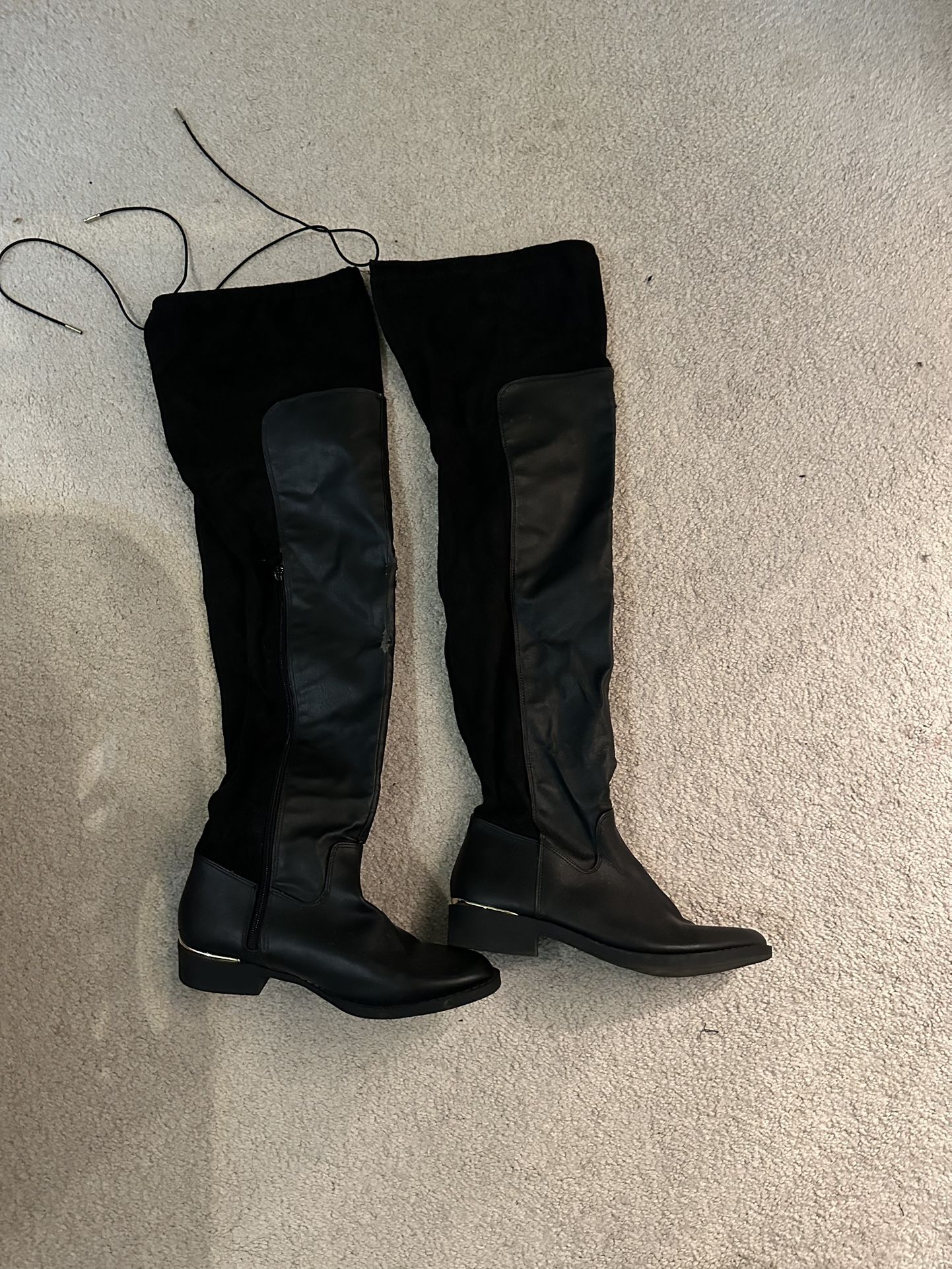 Over the knee black boots