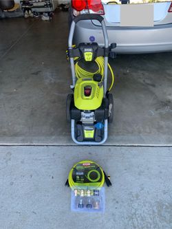 pressure washer w/ extra hose and attachments 