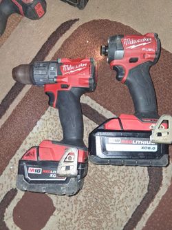 Millwaukee  fuel drills  with batteries