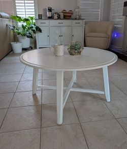 Modern round white coffee table