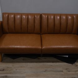 Novogratz Brittany Futon (Convertible Sofa) in Camel Faux Leather. 
