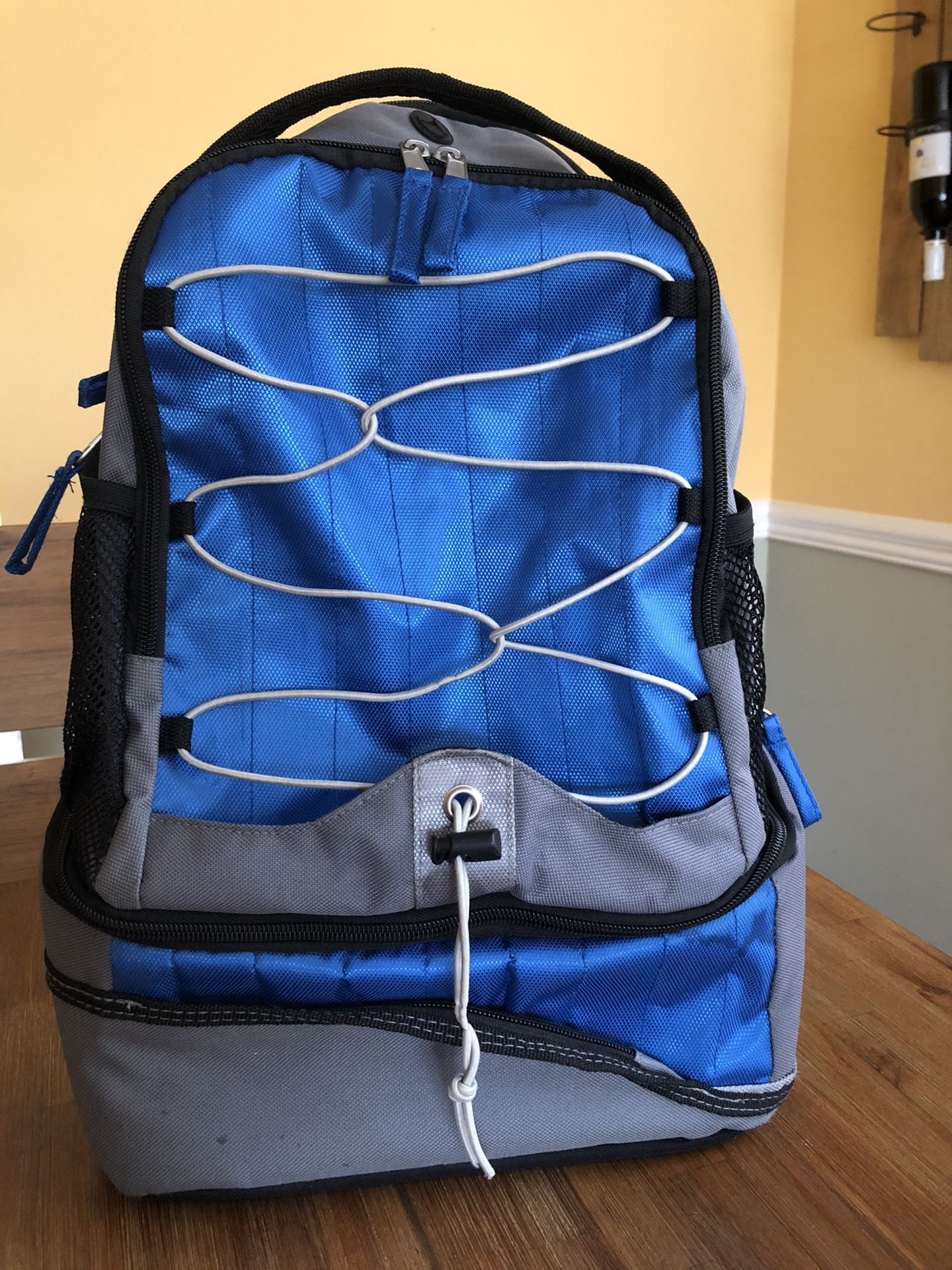 Backpack with insulated cooler.