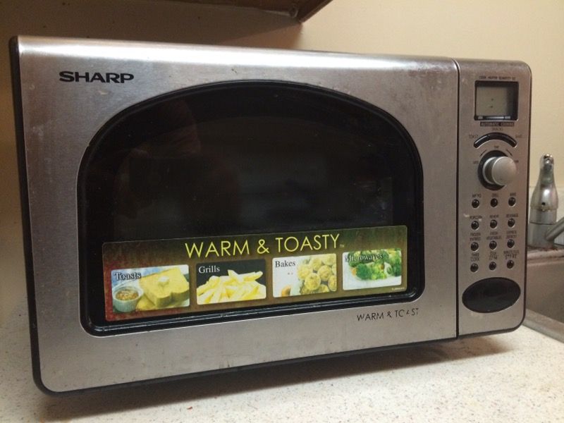 Toaster plus Microwave by Sharp Warm and Toasty R-55TS