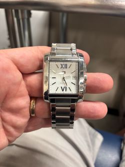 Vintage Tommy Hilfiger men’s tank watch. $40.00 obo.