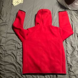 Red and black Nike tech