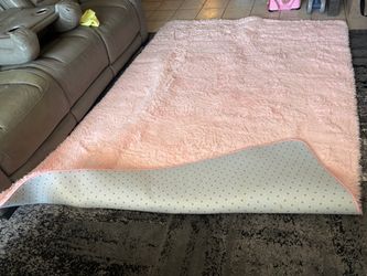 Pink area rug