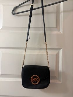 Black pebbled leather Michael Kors crossbody bag