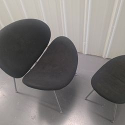 Big Black cushion chair with foot stool