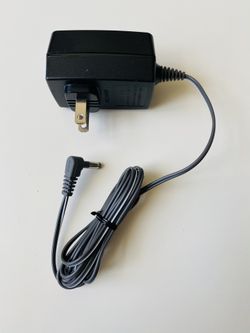 Genuine Panasonic AC Adaptor. PQLV 219. I.T.E. Power Supply. Input: 100-120V. 60Hz. 100 mA. Output: 6.5V. 500 mA. New. Never used.