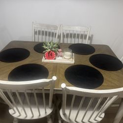 Kitchen table with chairs and console